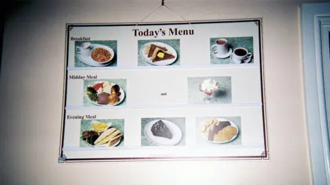 David Somerville-Wallace A wall planner showing the care home meal menu