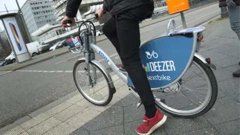 Getty Images A man on a nextbike rented bicycle in Berlin