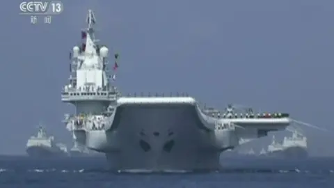Reuters Military vessel takes part in the naval display