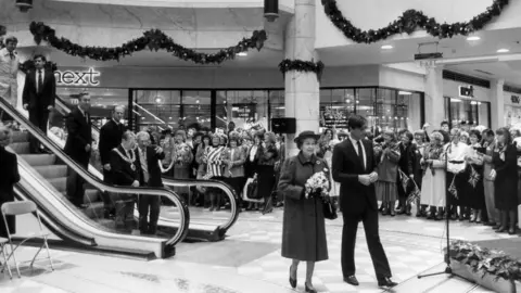 Getty Images The Queen tours a shopping centre in Bolton in 1968