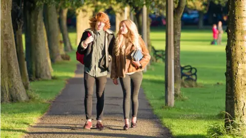 Getty Images Two students at University of Edinburgh