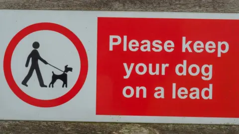 Getty Images Keep dogs on lead sign