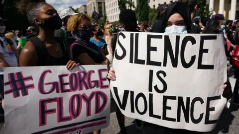 Getty Images signs at a George Floyd protest