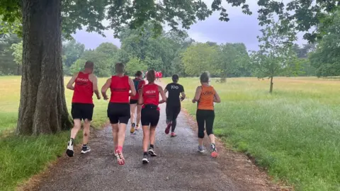 Runners running in Christchurch Park, Ipswich