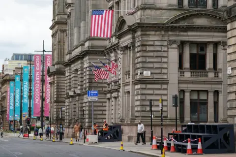 PA Media flags outside building