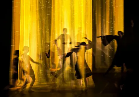 Georgi Licovski / EPA-EFE A multiple exposure photo of dancers from the Skopje Dance Theatre