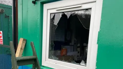 Humber Llamas A smashed window