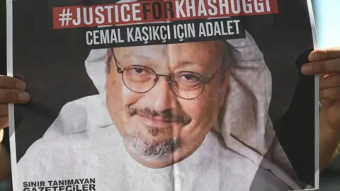 AFP File photo showing a poster demanding "Justice for Khashoggi" at a protest outside the Saudi consulate in Istanbul, Turkey, on 2 October 2020