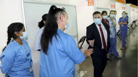 Niall Carson/PA Wire Robin Swann attended the closure of the vaccination centre at the SSE Arena in Belfast on Sunday