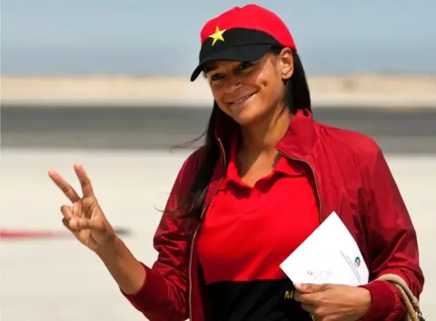 EPA A file photo dated 27 August 2012 shows Isabel dos Santos posing and making the V sign in Lobito, Angola, 29 January 2013.