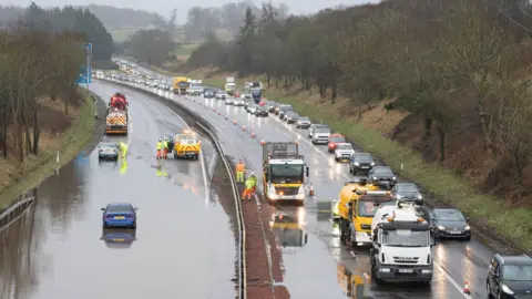 Severe flooding causes road and rail disruption in Scotland