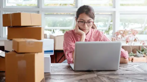 Getty Images Woman at laptop