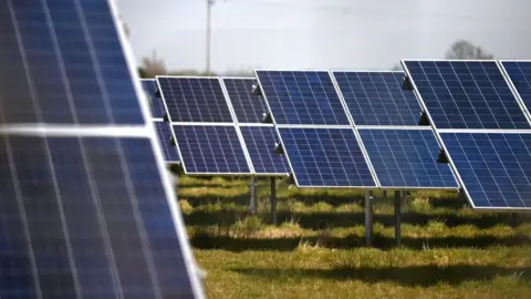 European Pressphoto Agency Solar panels in a field