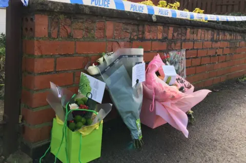 Flowers left at the scene on 16 January