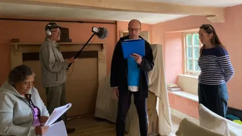 Maggie Curtis Rod Drew (centre) and Perwina Whitmore (left) with project producers Alastair Nisbet and Sharon Hayden at Hardy's Birthplace Visitor Centre