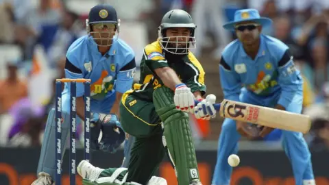 Getty Images Saeed Anwar of Pakistan sweeps during his century during the ICC Cricket World Cup 2003 Pool A match between India and Pakistan held on March 1, 2003.