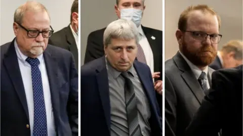 Reuters Travis and Gregory McMichael (left and right) and William Bryan (centre)