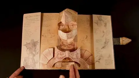 A paper engineering design of a knight created by David Hawcock