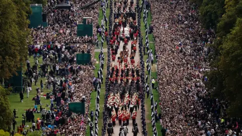 Reuters The Ceremonial Procession of the coffin of Queen Elizabeth II travels down the Long Walk as it arrives at Windsor Castle for the Committal Service at St George's Chapel.