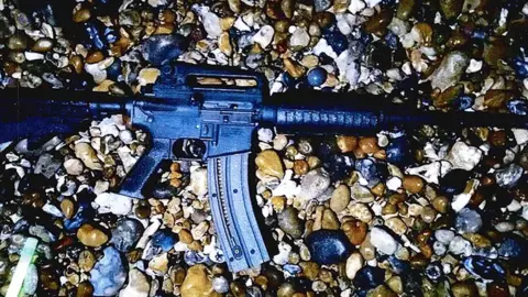 Sussex Police The gun used by Savage, which he stole from a firing range