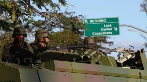 EPA  Brazilian troops in Rio, July 2017