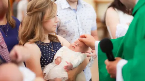 Getty Images A baby being christened