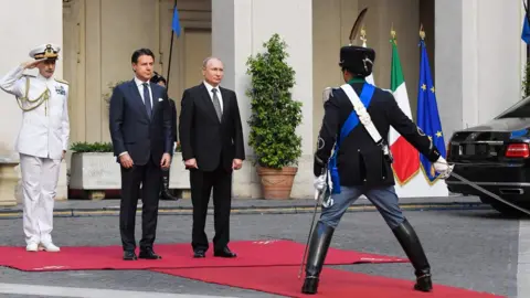 Tiziana Fabi / AFP Italian Prime Minister Giuseppe Conte and Russian President Vladimir Putin
