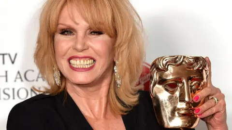 Getty Images Joanna Lumley with her Bafta TV Award in 2017