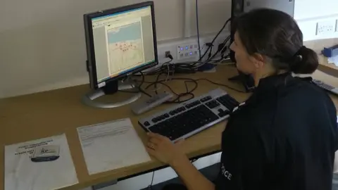 Getty Images Policewoman on computer