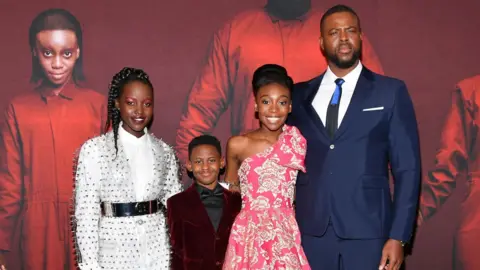 Getty Images Lupita Nyongo, Evan Alex, Shahadi Wright Joseph and Winston Duke at the Us premiere