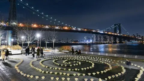 Erik Pendzich/REX/Shutterstock A sculpture of star-shaped candles