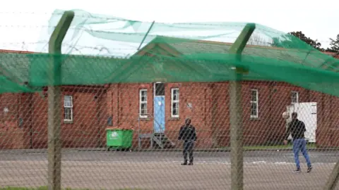 PA Media Asylum seekers at Napier Barracks