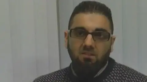 Met Police Still from a video clip showing Usman Khan praising Learning Together