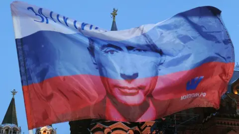 Getty Images Russian flag with Putin's face on