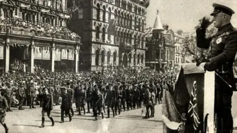 PRONI A parade took place in Belfast city centre in August 1919 to officially celebrate the armistice