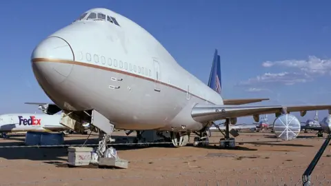 Getty Images Commercial passenger airplanes and cargo aircraft are stored in the dry desert air at the Mojave Airport