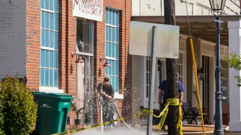 Getty Images Fire crews at the scene of the shooting in Dadeville