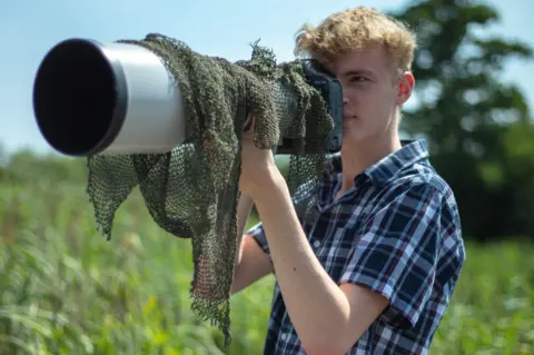 Alamy James with his camera