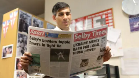 Conservative Party Rishi Sunak reading a newspaper