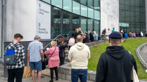 Getty Images queues outside passport office in Newport