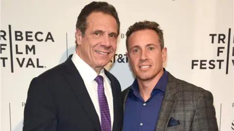 Getty Images Andrew (left) and Chris Cuomo seen at a film premiere in 2018