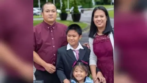 Family photo Julius Sana with his wife Maricar, son Marc and daughter Princess