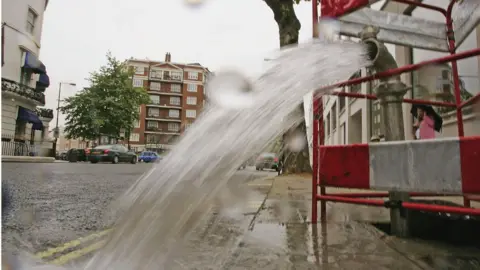 Getty Images Burst pipe in central London
