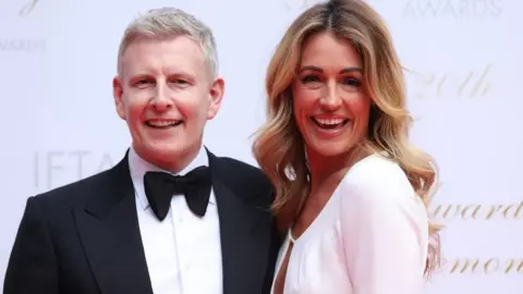 PA Media Patrick Kielty with his wife, presenter Cat Deeley