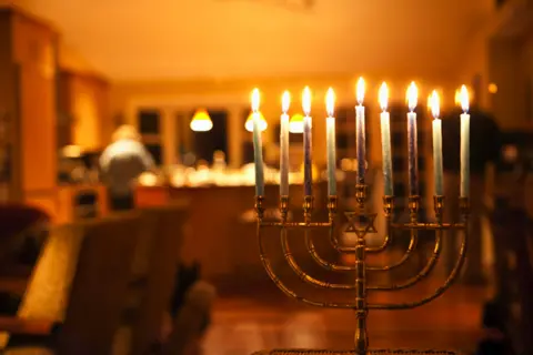 Getty Images A Hanukkah candle