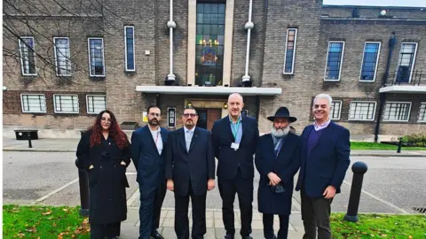 Havering Council Daniella Myers – Director of the London Jewish Forum, Marcus Chrysostomou – Head of Communications at Havering Council, Rabbi Lee Sunderland of Romford and District Synagogue, Cllr Ray Morgon – Leader of Havering Council, Rabbi Aryeh Sufrin MBE - Executive Director of Chabad North London & Essex, Daniel Rosenberg - Chair of the Essex Jewish Community Council.