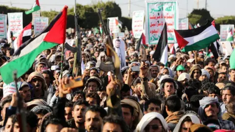 Reuters Houthi supporters in sanaa 12 Jan