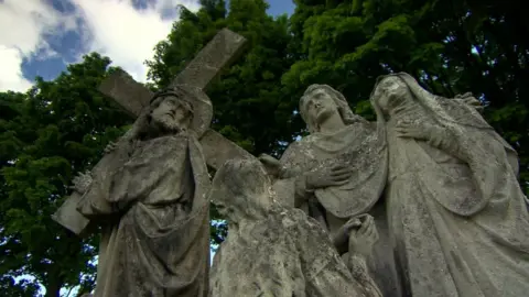 BBC Pictures of religious figures carrying a cross