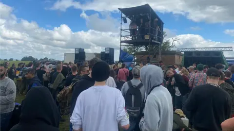 The scene at the rave near Bath on Sunday morning