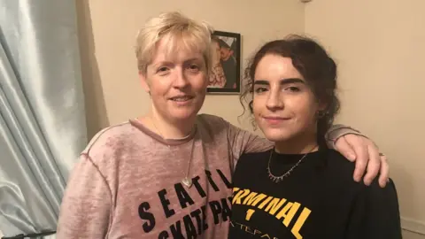 Nicola Bayless and daughter Darcy inside their house in Happisburgh